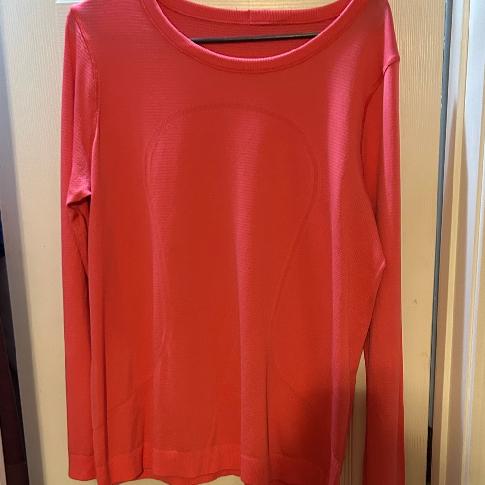 Women's Pink Long Sleeve Top. Lululemon swiftly breeze size 12(?)